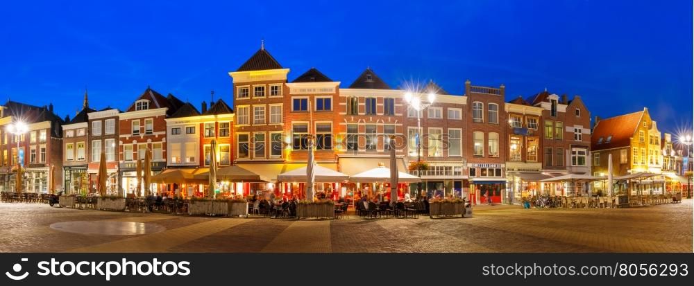 Panorama Markt square with typical Dutch houses in the center of the old city at night, Delft, Holland, Netherlands