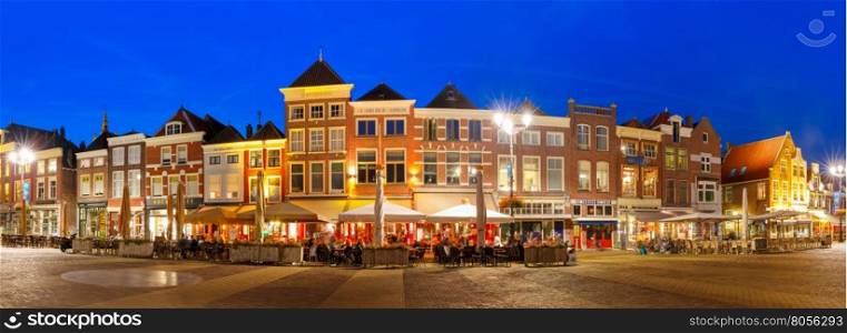 Panorama Markt square with typical Dutch houses in the center of the old city at night, Delft, Holland, Netherlands