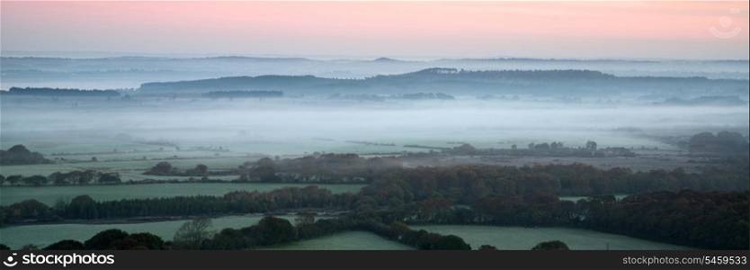 Panorama misty countryside landscape vibrant dawn sunrise