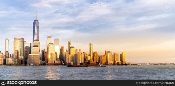 Panorama New York city Manhattan skyline cityscape at sunset from New Jersey.