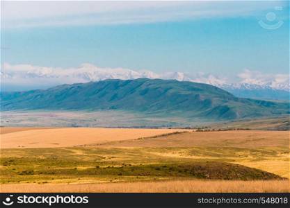 Panorama of a beautiful landscape with mountain ranges in Kazakhstan.. Panorama of a beautiful landscape with mountain ranges in Kazakhstan
