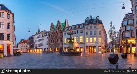Panorama of Amagertorv square, Stroget street during morning blue hour, Copenhagen, capital of Denmark. Stroget street, Amagertorv, Copenhagen, Denmark