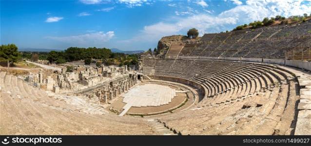 Panorama of Amphitheater (Coliseum) in ancient city Ephesus, Turkey in a beautiful summer day