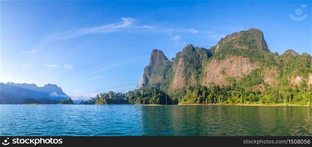 Panorama of Beautiful nature at Cheow Lan lake, Ratchaprapha Dam, Khao Sok National Park in Thailand in a summer day