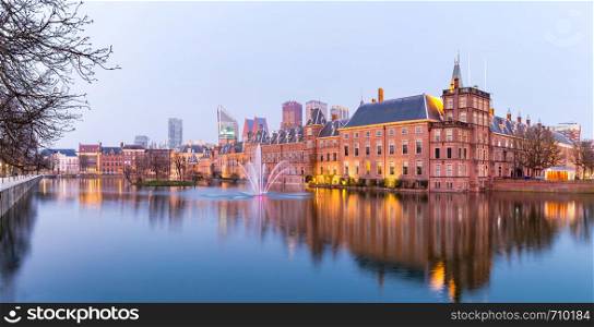 Panorama of Binnenhof palace, place of Parliament in The Hague, of Netherlands at dusk