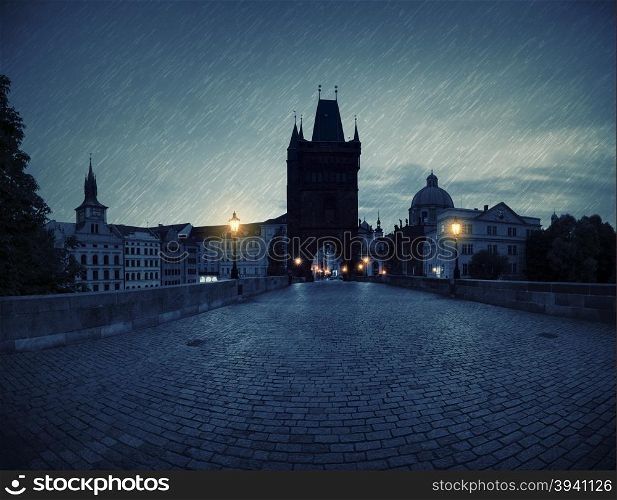 Panorama of Charles Bridge at rainy night, Prague, Czech Republic