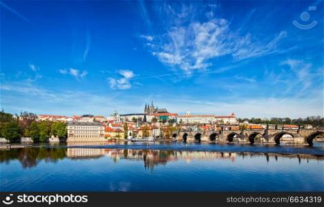 Panorama of Charles bridge over Vltava river and Gradchany (Prague Castle) and St. Vitus Cathedral. Czech Republic. Charles bridge over Vltava river and Gradchany (Prague Castle)