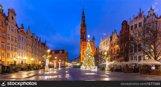 Panorama of Christmas tree and illumination on Long Market Street and Town Hall at night in Old Town of Gdansk, Poland. Christmas Long Lane and Town hall, Gdansk, Poland