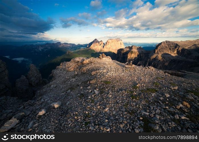 Panorama of cloudy sunrise at Dolomites mountains, Italy