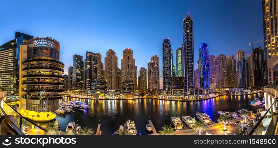 Panorama of Dubai marina in a summer night, Dubai, UAE.