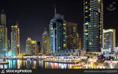 Panorama of Dubai marina in a summer night, Dubai, UAE.