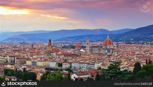 Panorama of Duomo Santa Maria Del Fiore and tower of Palazzo Vecchio at sunset  in Florence, Tuscany, Italy