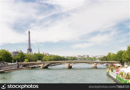 Panorama of Eiffel Tower along river seine, Paris France