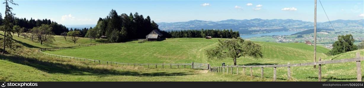 Panorama of farm field in Switzerland
