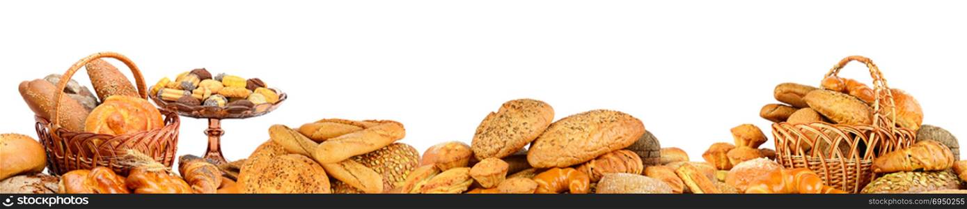 Panorama of fresh bread products isolated on white background.