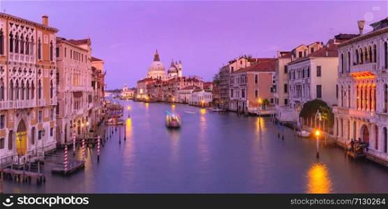 Panorama of Grand canal and The Basilica of St Mary of Health or Santa Maria della Salute at sunset in Venice, Italy. Santa Maria della Salute, Venice