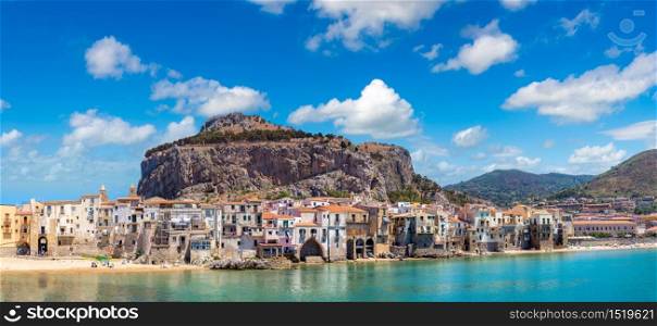Panorama of Harbor and old houses in Cefalu in Sicily, Italy in a beautiful summer day