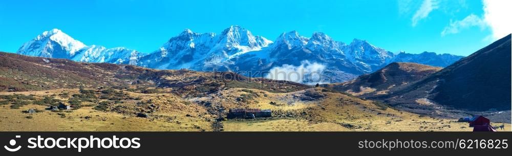 Panorama of high mountains in snow. Kangchenjunga, India