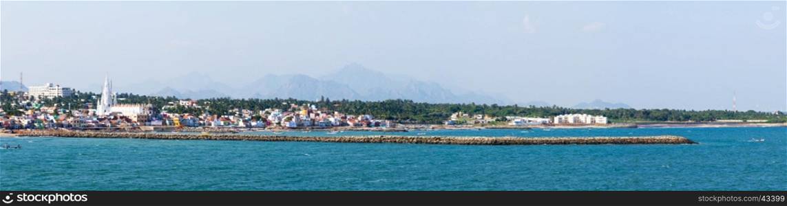 Panorama of Laccadive Sea and Kanyakumari town on the background of mountains at the southernmost point of India, formerly known as Cape Comorin in the state of Tamil Nadu in India.