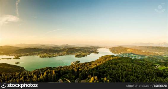 Panorama of Lake and mountains at Worthersee Karnten Austria. View from Pyramidenkogel tower on lake and Klagenfurt the area.. Panorama Lake and mountains at Worthersee Karnten Austria tourist spot