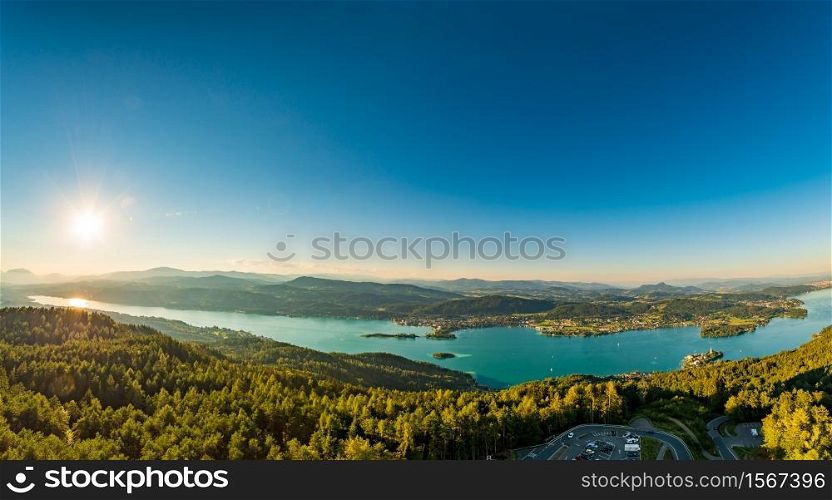 Panorama of Lake and mountains at Worthersee Karnten Austria. View from Pyramidenkogel tower on lake and Klagenfurt the area.. Lake and mountains at Worthersee Karnten Austria tourist spot