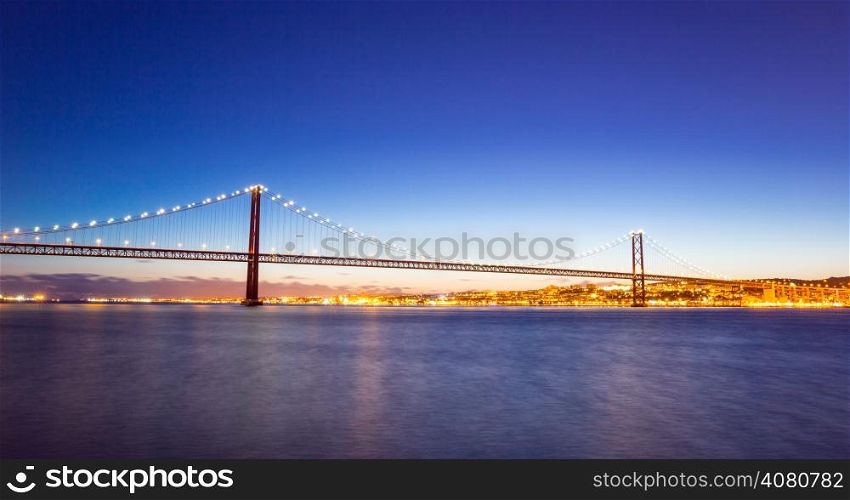panorama of Lisbon cityscape and the 25 de Abril Bridge, Portugal