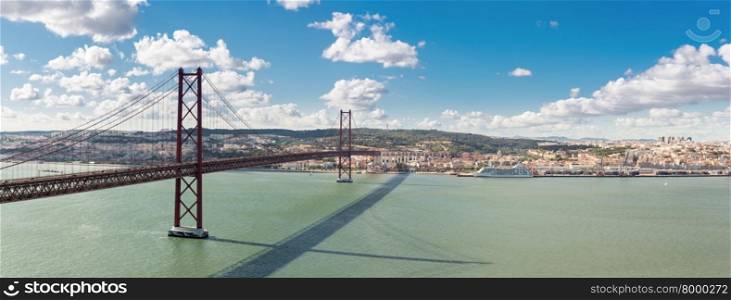 Panorama of Lisbon cityscape with 25 de Abril suspension Bridge, Portugal