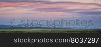 panorama of Medicine Bow Mountains at dusk in early summer, North Park, Colorado near Cowdrey