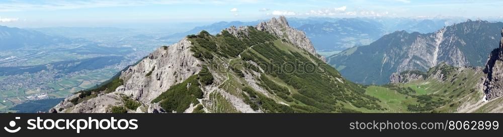 Panorama of mountain range with hiking trail in Lichtenstein