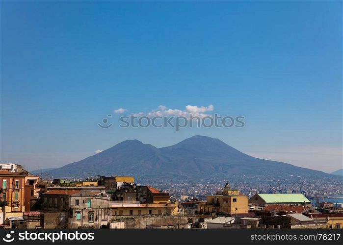 Panorama of napoli with vesuvius,cloidds and buildings