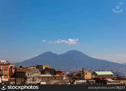 Panorama of napoli with vesuvius,cloidds and buildings