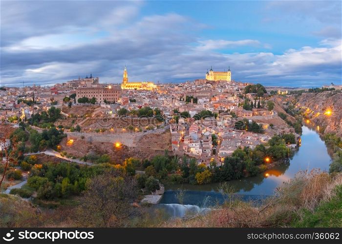 Panorama of Old city of Toledo and river Tajo at dusk, Castilla La Mancha, Spain