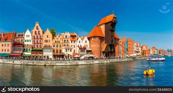 Panorama of Old Town with Old harbour crane and city gate Zuraw, Dlugie Pobrzeze and Motlawa River, Gdansk, Poland