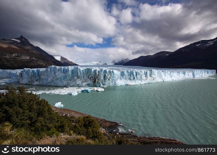 Panorama of Perito Moreno glacier with lake in South America