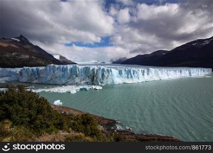 Panorama of Perito Moreno glacier with lake in South America