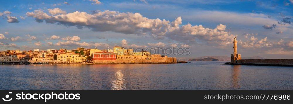 Panorama of picturesque old port of Chania is one of landmarks and tourist destinations of Crete island in the morning on sunrise. Chania, Crete, Greece. Picturesque old port of Chania, Crete island. Greece