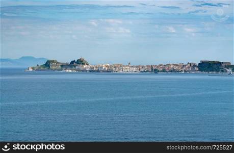 Panorama of port and old town of Kerkyra from sea. Panoramic view of old town Kerkyra on island of Corfu