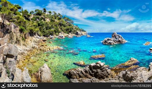 Panorama of Rocks on the coast of Lloret de Mar in a beautiful summer day, Costa Brava, Catalonia, Spain
