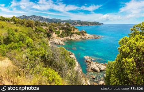 Panorama of Rocks on the coast of Lloret de Mar in a beautiful summer day, Costa Brava, Catalonia, Spain