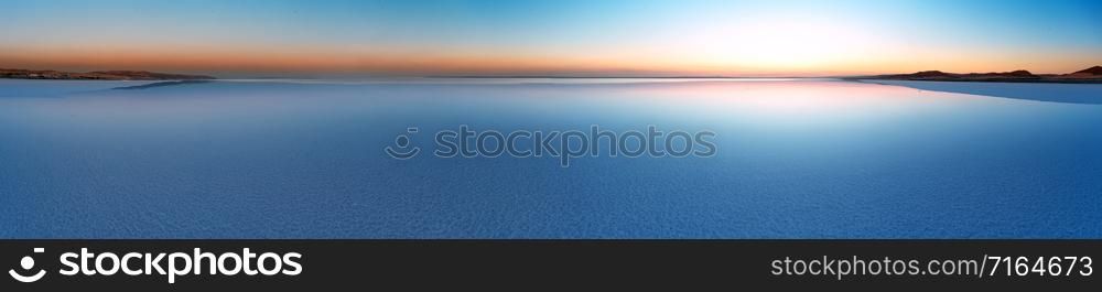 Panorama of Salt Lake Tuz at sunset. Summer landscape. Anatolia, Turkey. Panorama of Salt Lake Tuz at sunset