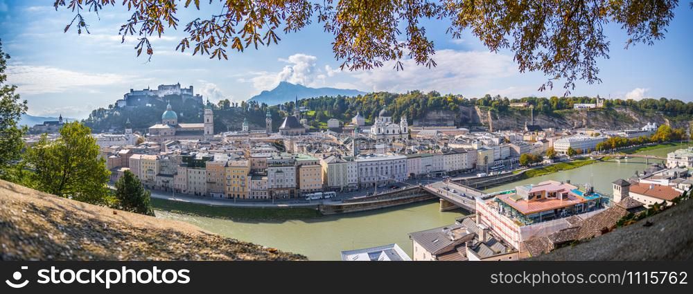 Panorama of Salzburg historic district at autumn time, colorful leaves and colors with sunshine, Austria