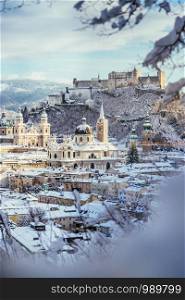 Panorama of Salzburg in winter: Snowy historical center, sunshine