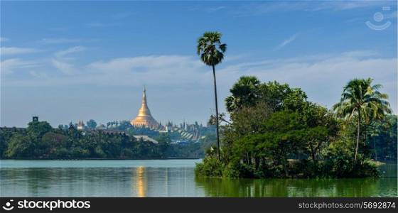 Panorama of Shwedagon Pagoda over Kandawgyi Lake in Yangon, Burma Myanmar