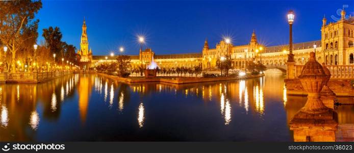 Panorama of Spain Square or Plaza de Espana in Seville at night, Andalusia, Spain