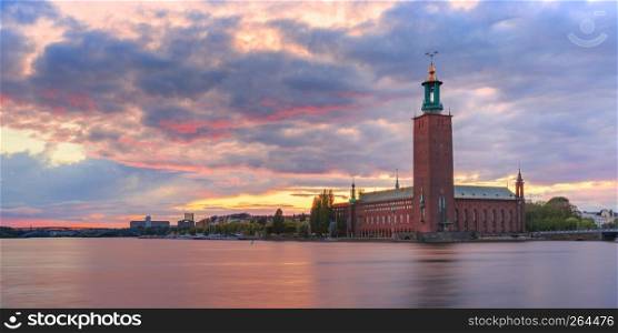 Panorama of Stockholm City Hall or Stadshuset at sunset in the Old Town in Stockholm, capital of Sweden. City Hall at sunset, Stockholm, Sweden