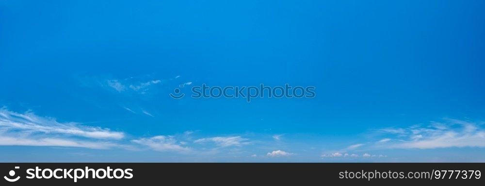 Panorama of summer blue sky with rare clouds. Summer blue sky with rare clouds
