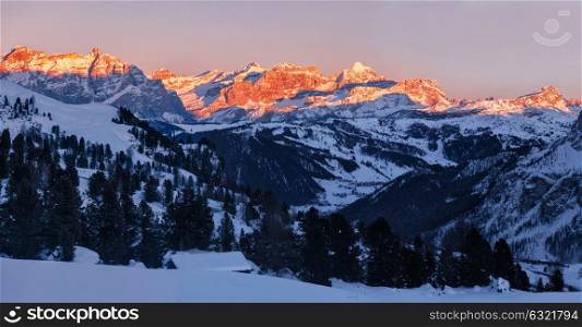 panorama of sunset over Dolomites Fanis, South Tyrol, Italy. Panoramic view of sunset over Dolomites Fanis from Passo Gardena, South Tirol, Dolomites mountains, Italy