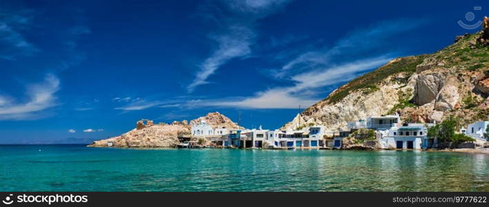 Panorama of the beach and fishing village of Firapotamos in Milos island, Greece. The beach of Firapotamos in Milos, Greece