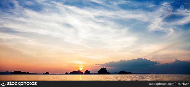 Panorama of the beautiful sea sunset with islands on background