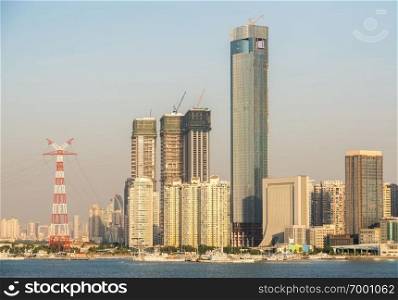 Panorama of the city skyline of Xiamen in China from the ocean. Skyline of the city of Xiamen from the sea approaching port